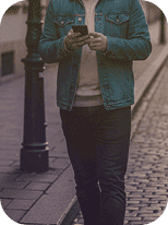 Person walking while looking at their phone